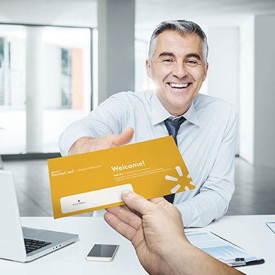 man-handing-card-to-client man-handing-card-to-client