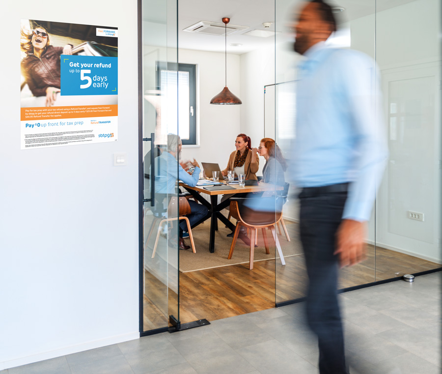 Diverse Group of Employees Moving Around Open Space Office Tax refund up to 5 days early